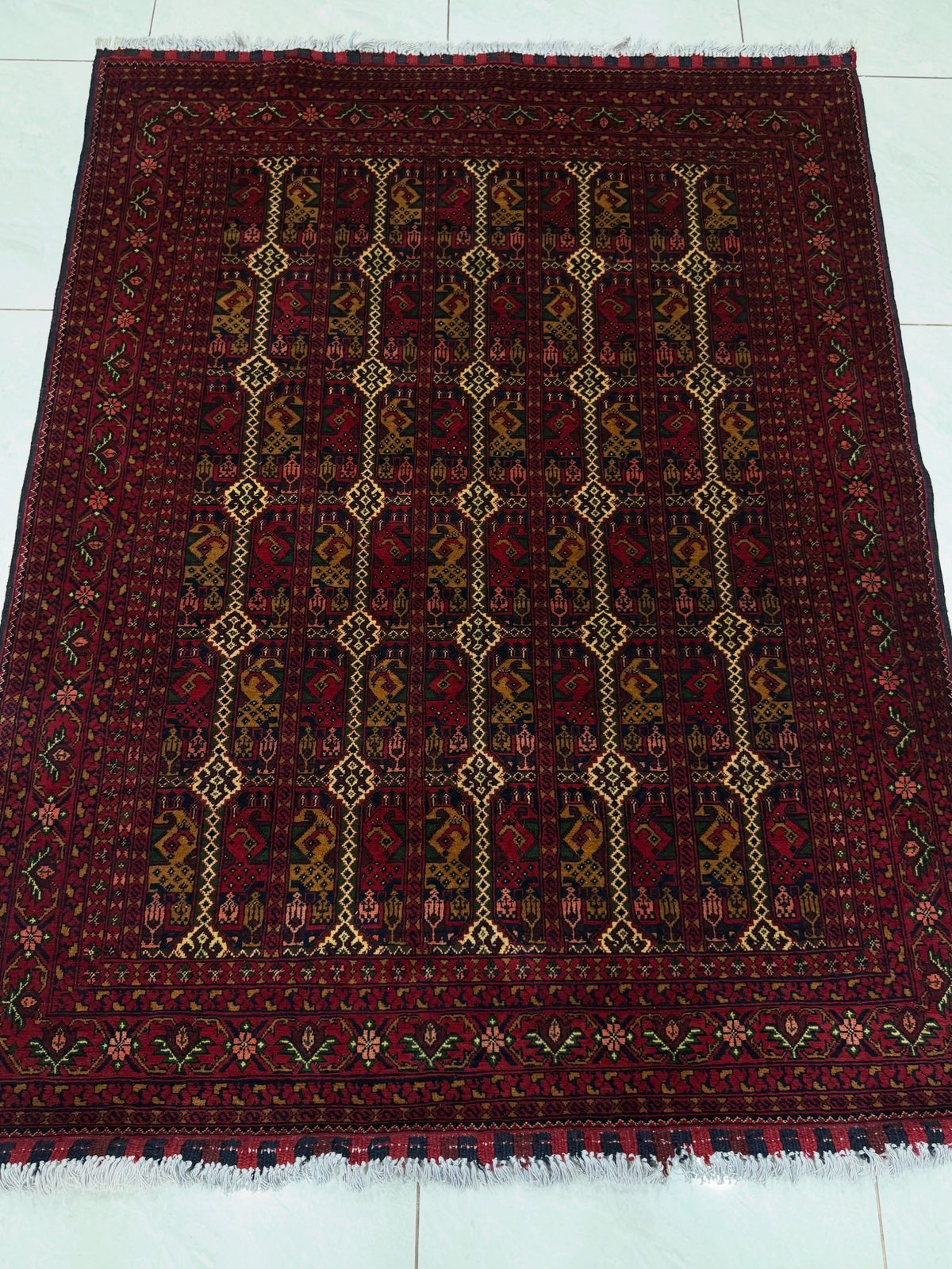 Hand-knotted Bokhara rug in deep red