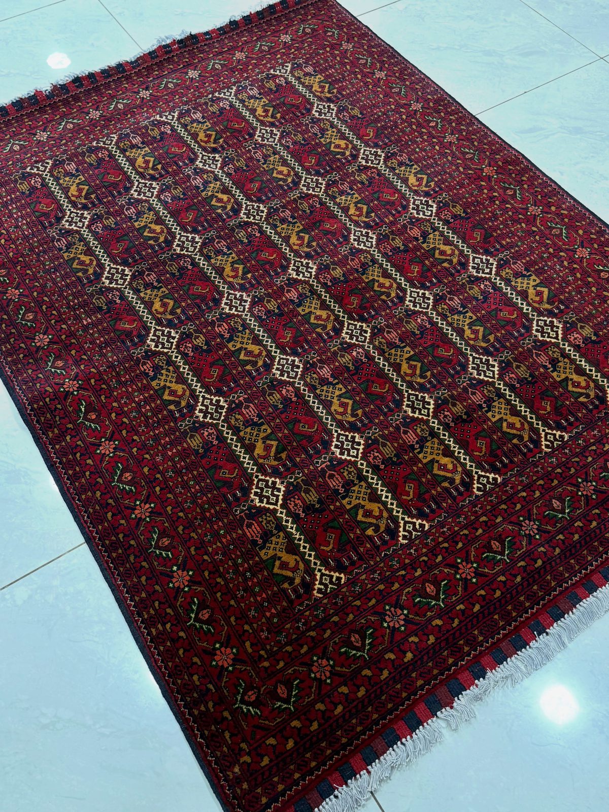 Hand-knotted rug in deep red